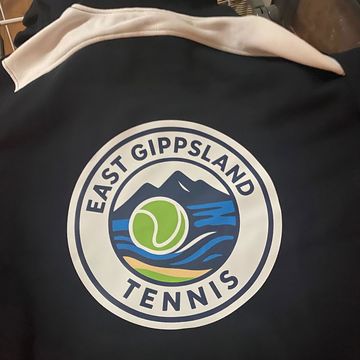 Jade's tennis club shirt