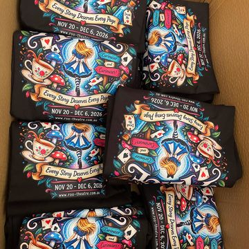 Little Chick's stack of printed tees